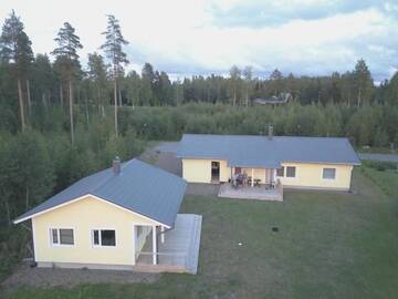 Фото номера Вилла с 3 спальнями Дома для отпуска Lakeside house г. Haukivuori 32